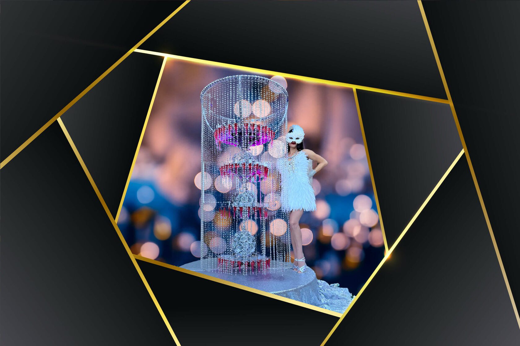 Crystal champagne tower with glasses and a performer at a Las Vegas event