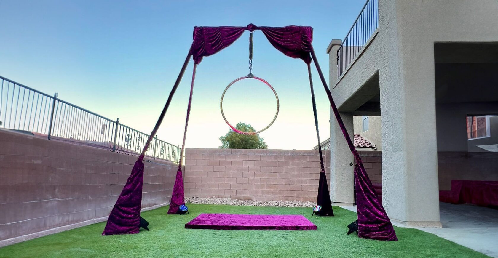 Dark Romance velvet rig with aerial hoop outdoors