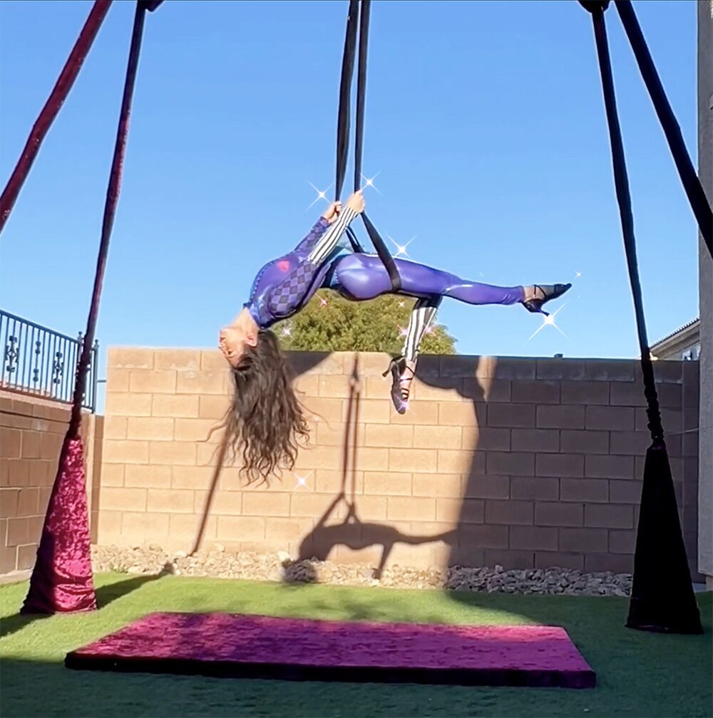 Inverted silks pose on the Dark Romance rig