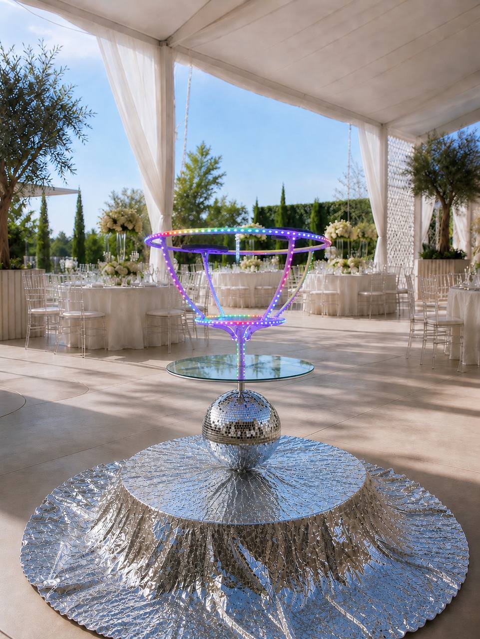 Disco Luxe Platform with a purple-lit LED sphere prop in a daylight event tent — Las Vegas